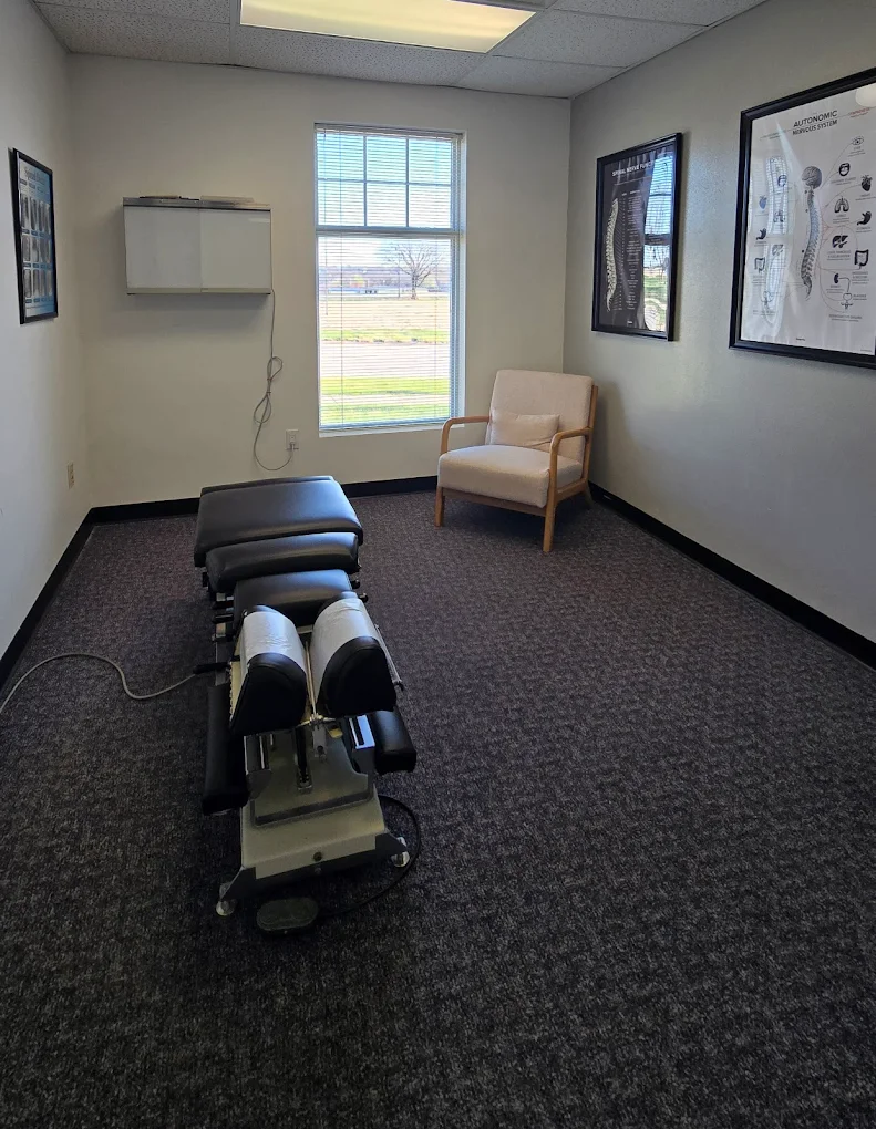 Chiropractor providing gentle care to a patient at Anderson Family Chiropractic in Pleasant Hill, IA